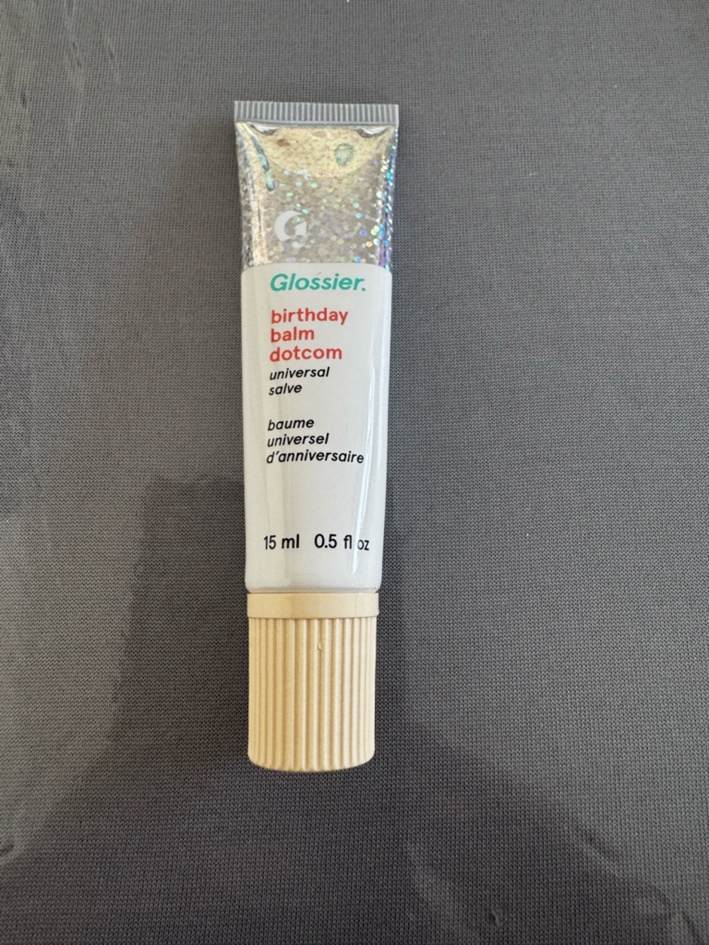 Glossier Birthday Balm Dotcom - White Tube with Holographic Top and Beige Cap